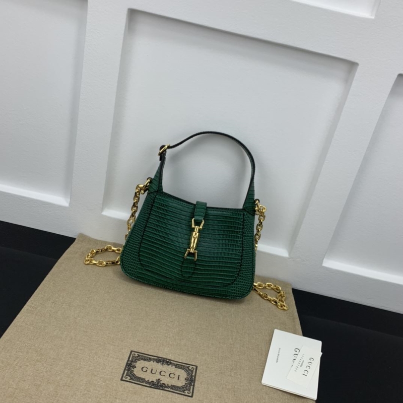 G*u*i top handle bags